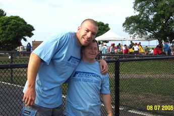 An athlete and his volunteer